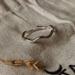 Wavy silver band ring for modern style
