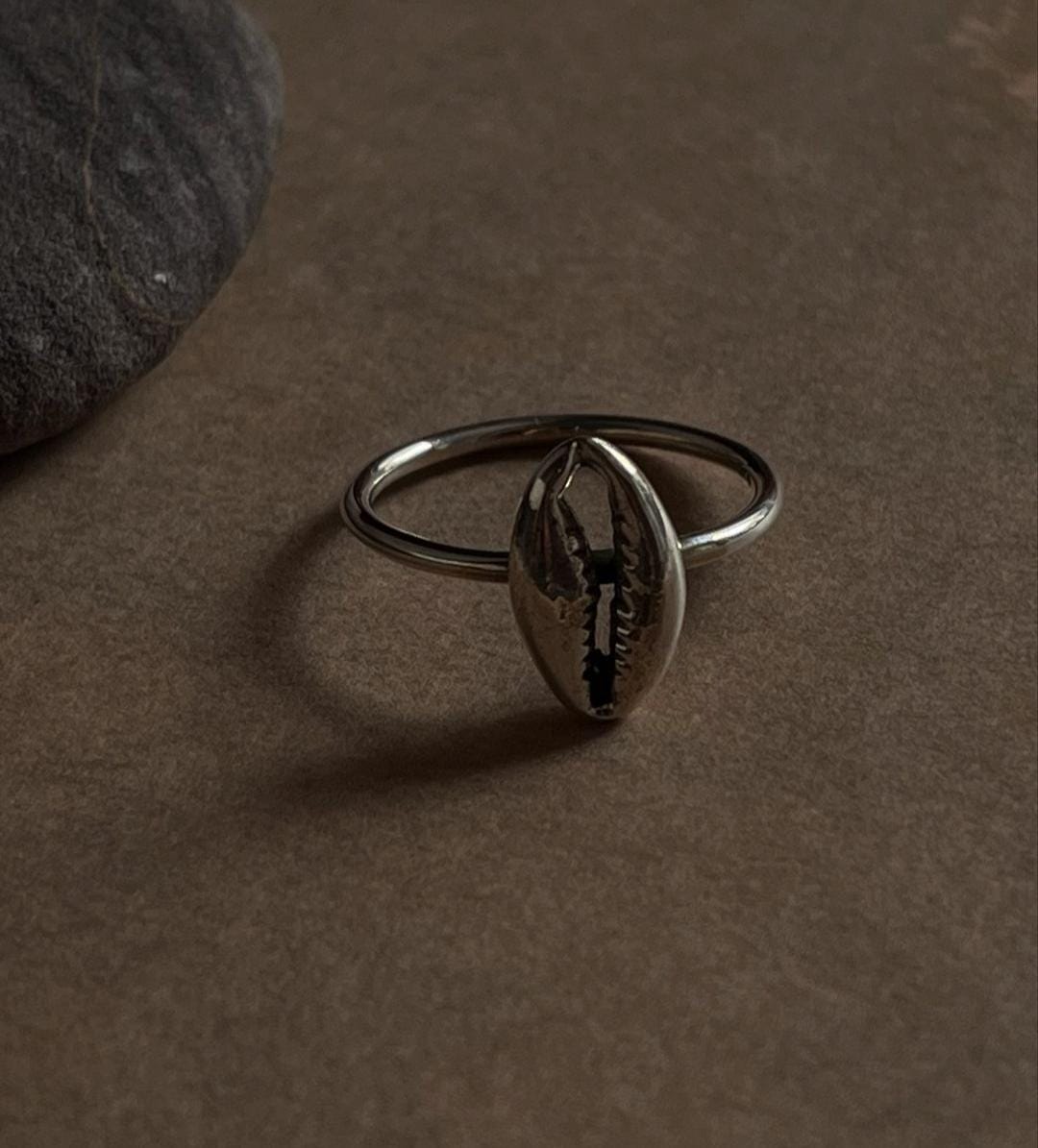Cowrie seashell silver ring with beach-inspired charm
