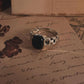 Handcrafted black onyx Cuban link band ring in sterling silver.