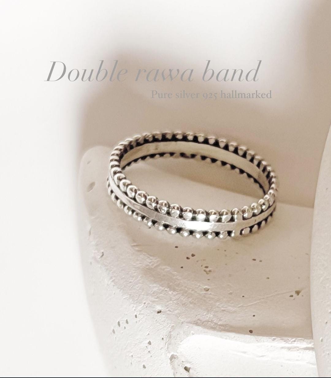 Elegant double rawa silver band ring with intricate detailing