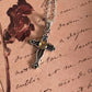 Stylish vintage silver pendant featuring a citrine cross centerpiece