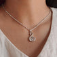 Handcrafted Blue Topaz Swan Pendant in Silver