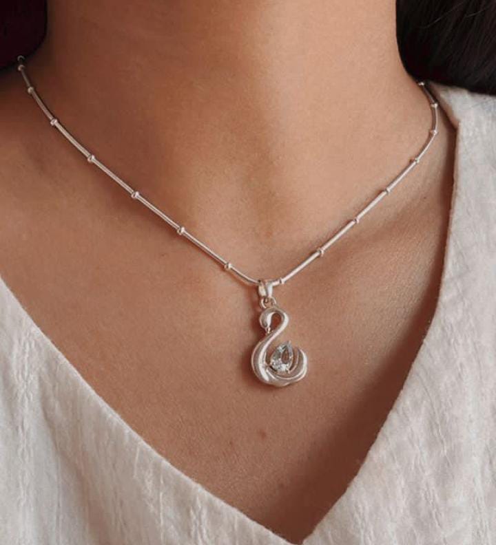 Handcrafted Blue Topaz Swan Pendant in Silver