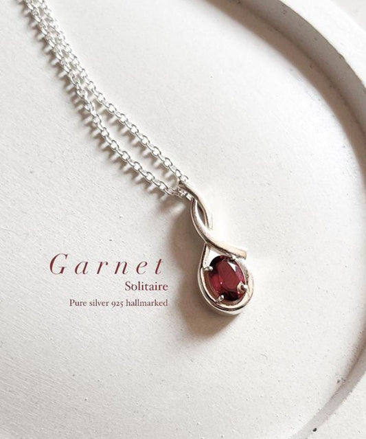 Garnet solitaire silver necklace with an attached chain