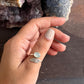 Handcrafted adjustable silver ring with a feather motif and aqua chalcedony.