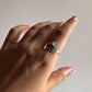 Timeless silver ring with a feather detail and aqua chalcedony, adjustable fit.