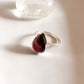 Sterling silver ring with a large pear-shaped garnet gemstone