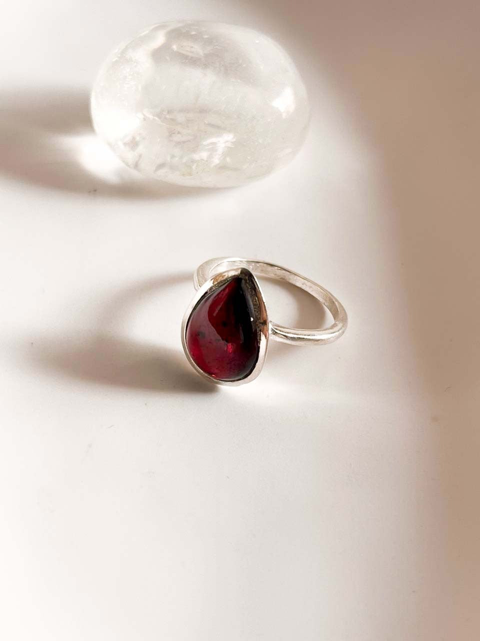 Sterling silver ring with a large pear-shaped garnet gemstone