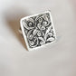 Vintage-style silver 925 ring with a tribal Chitai flower design.