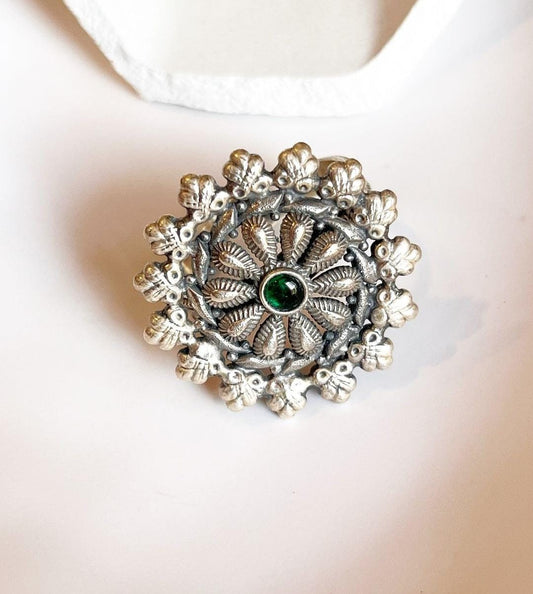 Handcrafted antique silver 925 ring featuring a green flower mandala pattern.