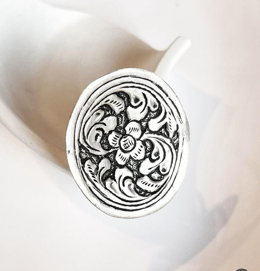 Elegant adjustable antique silver ring with tribal Chitai flower motif.