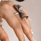 Vintage-inspired peacock ring with freshwater pearls in sterling silver 925.