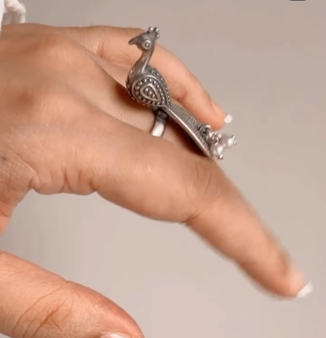 Antique peacock design ring with freshwater pearls and adjustable sterling silver band.
