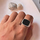 Bold black onyx big faceted signet ring with striking design.
