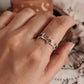 Handcrafted silver ring with round band and star accents