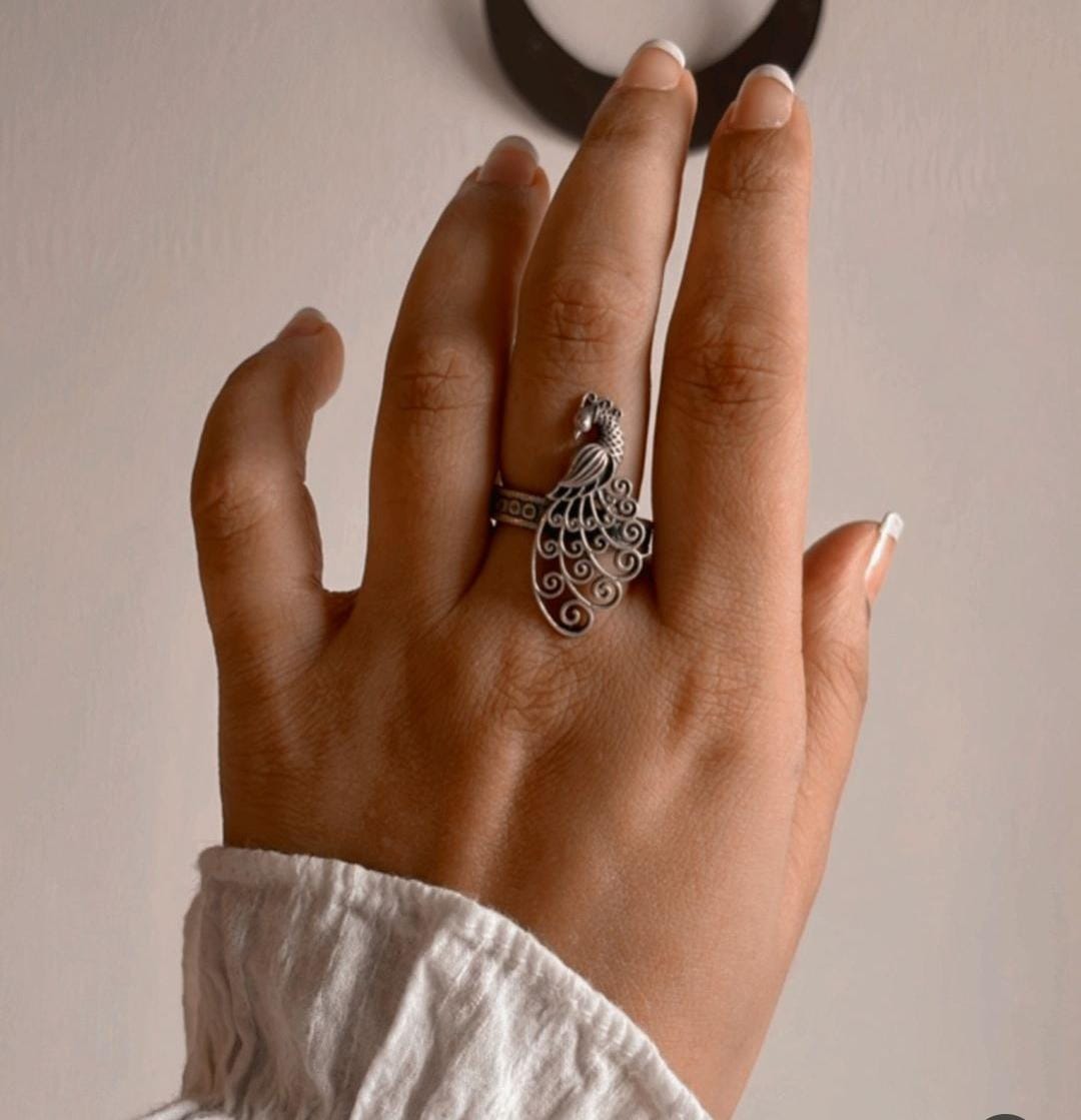 Antique filigree style silver 925 adjustable ring with peacock design.