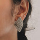 Elegant handcrafted Rawa design earrings in silver