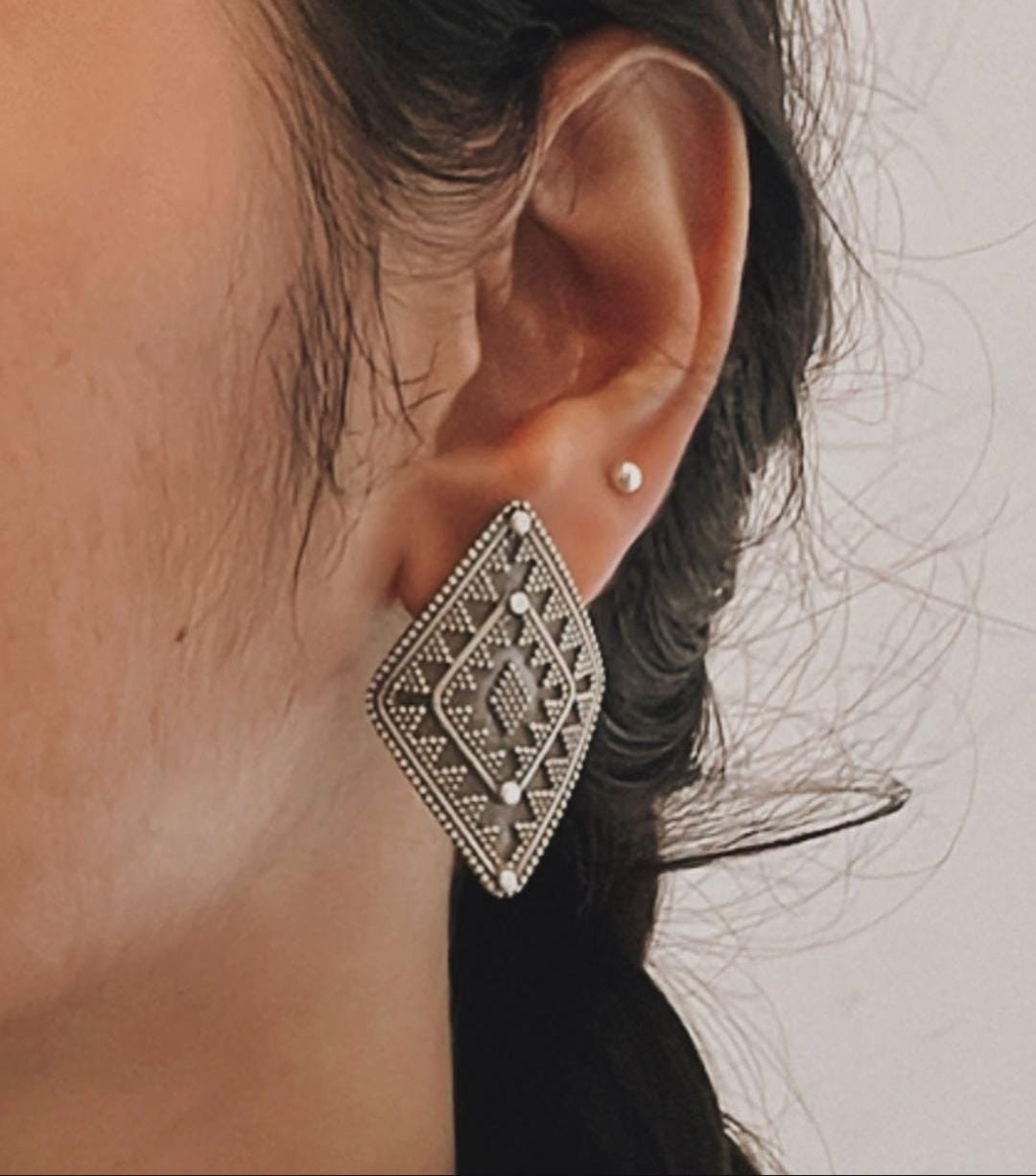 Elegant handcrafted Rawa design earrings in silver