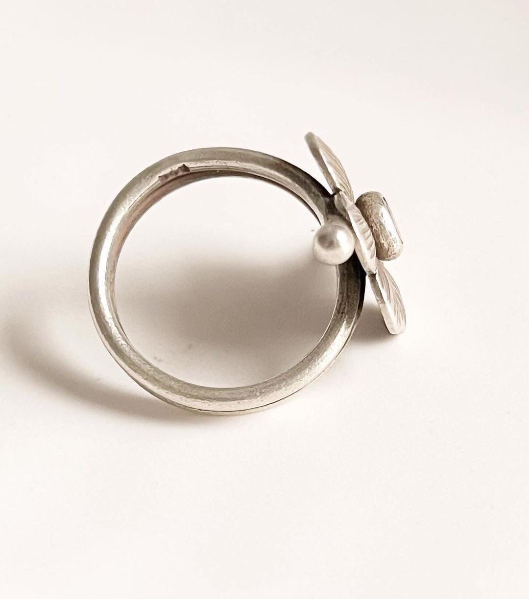 Antique boho flower ring with intricate detailing in sterling silver.