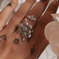 Adjustable sterling silver 925 ring with a vintage floral pattern.