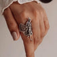 Sleek and sophisticated adjustable silver 925 ring with angel filigree design
