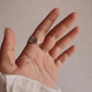 Handcrafted feather wrap adjustable silver ring with a boho chic vibe