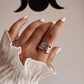 Elegant feather wrap adjustable silver ring with intricate detailing