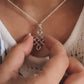 Handcrafted big karma silver pendant featuring a Celtic knot design.