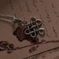 Elegant big Celtic knot pendant with a karma symbol in sterling silver.