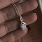 Sterling Silver Moonstone Cross Pendant with Solitaire Design