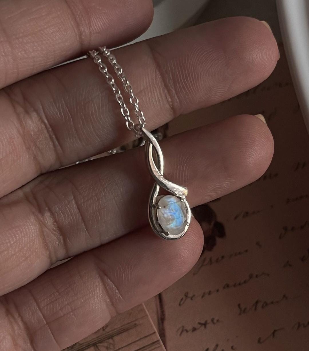 Sterling Silver Moonstone Cross Pendant with Solitaire Design