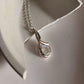 Charming Moonstone Cross Solitaire Silver Pendant for Spiritual Elegance