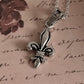 Versatile Fleur De Lis silver pendant ideal for both casual and formal wear