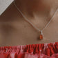 Elegant carnelian rectangle pendant with polished silver frame