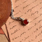 Stylish carnelian round gemstone on a silver pendant necklace