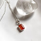 Stylish carnelian rectangle pendant in sterling silver setting