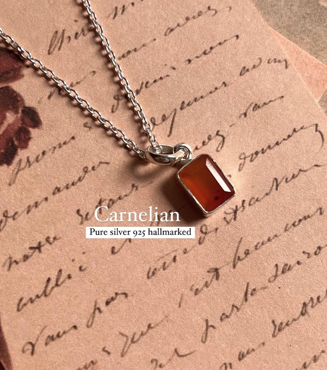 Carnelian rectangular stone set in a sleek silver pendant
