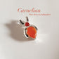Carnelian pear-shaped pendant on a delicate chain necklace