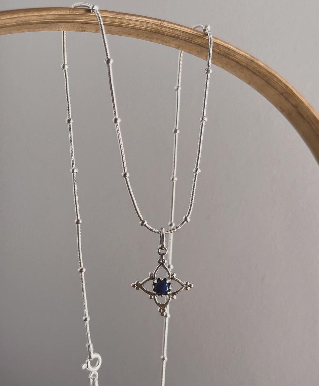 Lapis Lazuli Silver Pendant with Flower Rawa Design for Unique Charm