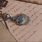 Exquisite aquamarine stone set in a boho-style silver pendant.