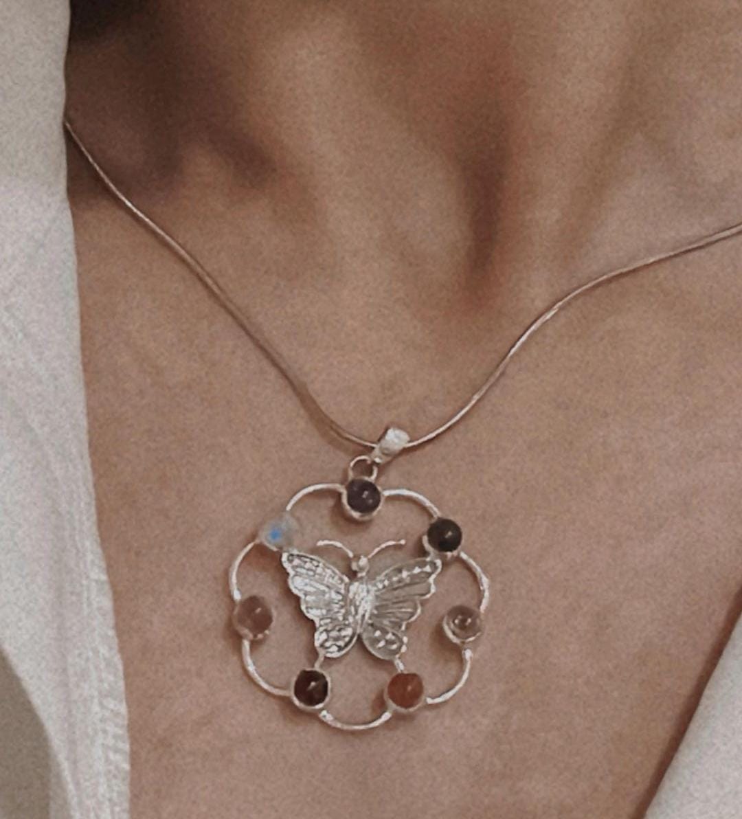 Seven Chakra butterfly silver pendant with colorful gemstones