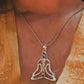 Sterling silver pendant featuring seven chakra symbols