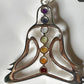 Handcrafted silver pendant with Yogi and chakra design