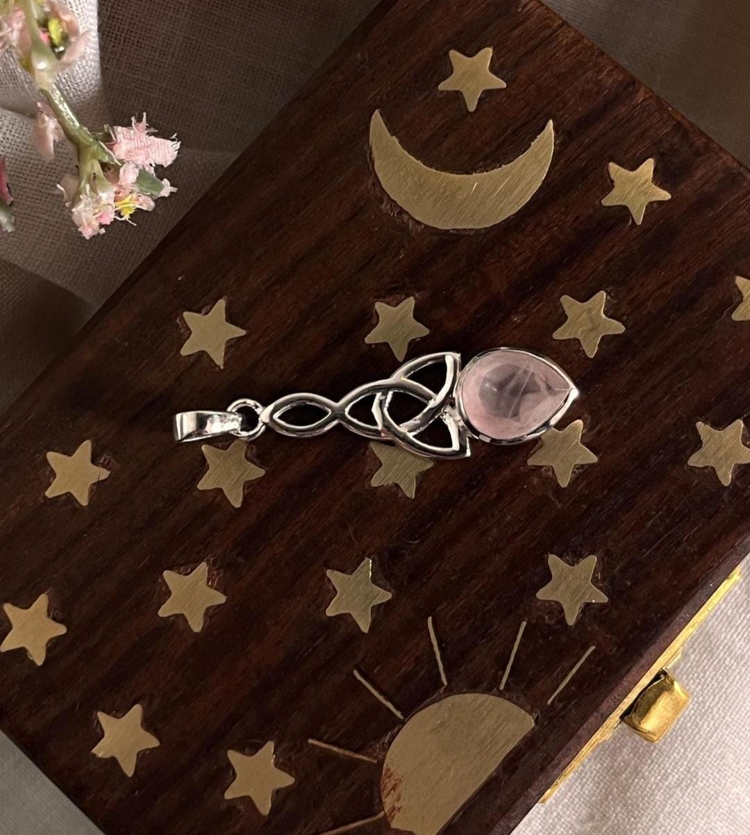 Sterling silver rose quartz pendant with trinity knot symbol