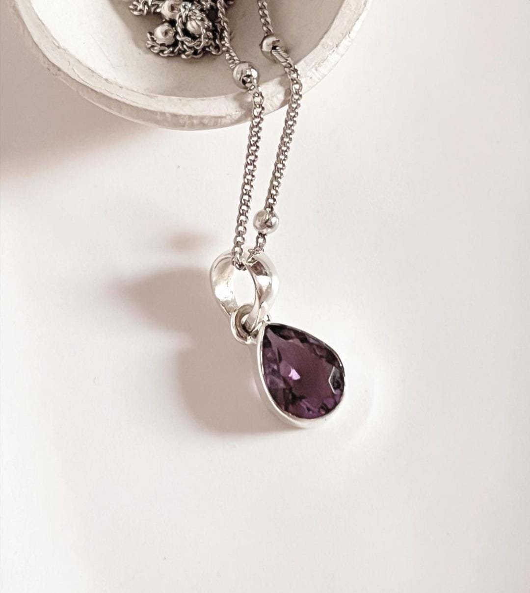 Elegant Pear-Cut Amethyst Pendant in Silver Setting