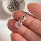 Elegant round cut rose quartz pendant with silver setting