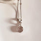 Sophisticated round cut rose quartz pendant in high-quality silver