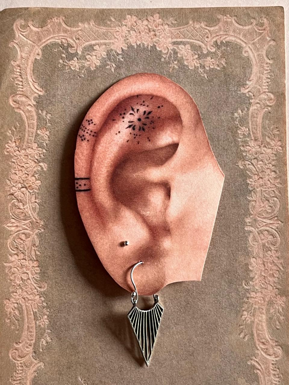 Fashionable Triya Boho silver hoop earrings