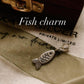 Tribal fish sterling silver pendant