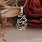 Antique-inspired rose silver pendant